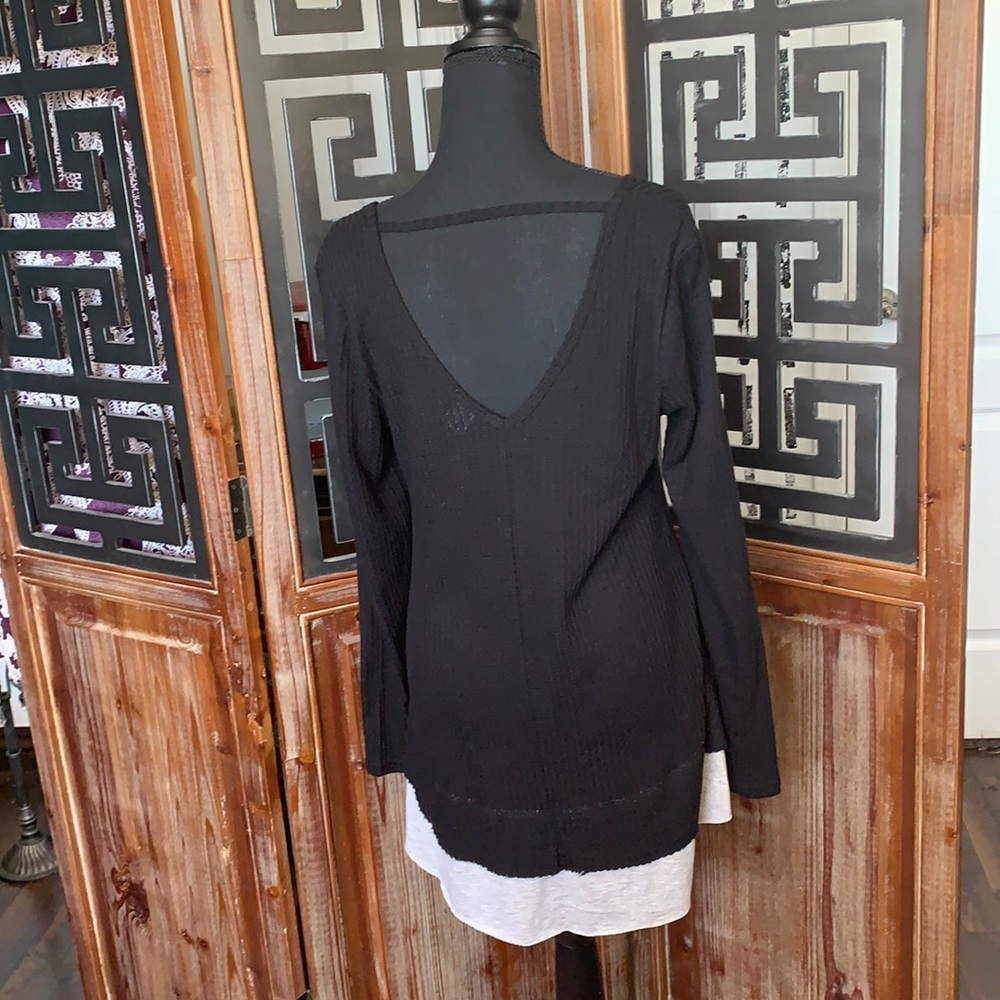 Black waffle knit top with contrasting shirt hem